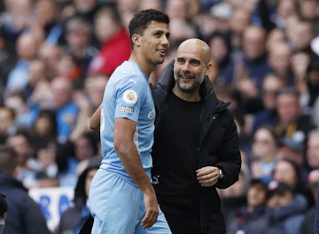 Rodri och Pep Guardiola